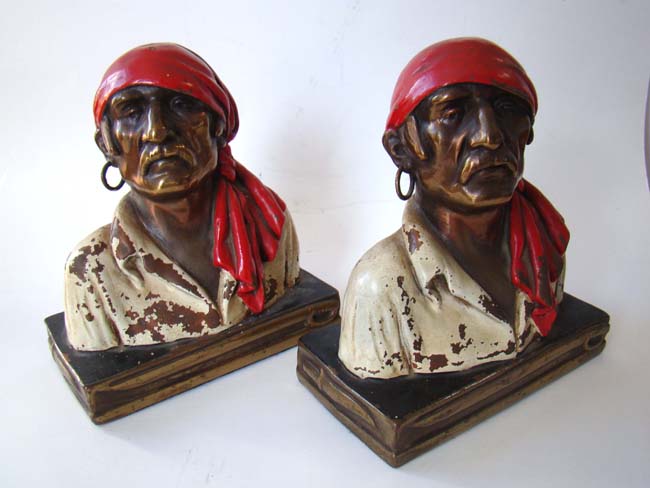 A pair of Pirate Head bookends designed by Paul Herzel in 1928